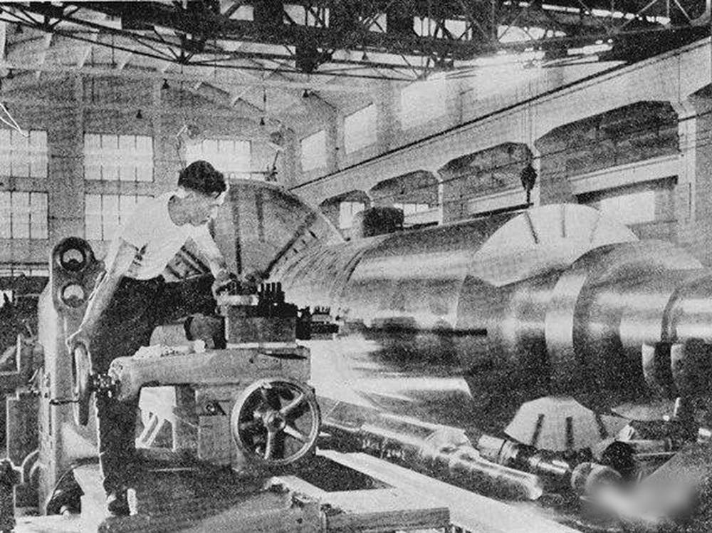 工業(yè)史話還記得80年代上海電機(jī)廠的扁擔(dān)電機(jī)精神嗎